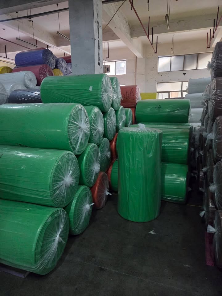 Colorful EVA foam rolls in warehouse